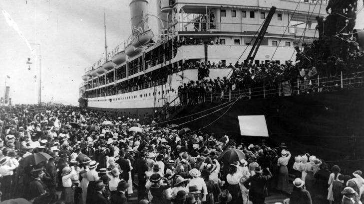 Crowds line the dockside in Melbourne, as a troopship prepares to depart in 1917. Photo: Getty-Images