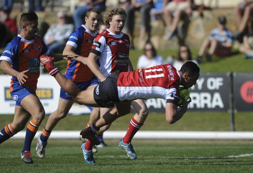Vikings winger Lausii Taliauli lunges at the try line, but falls just short. Photo: Graham Tidy