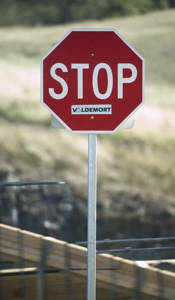Vandalised 'Stop' sign on Federal Highway off ramp to Horsepark Drive. Photo: Elesa Lee