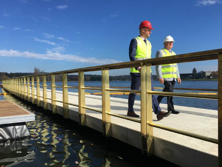 Andrew Barr and Mick Gentleman check out the first part of the West Basin boardwalk on Tuesday. Photo: Kirsten Lawson
