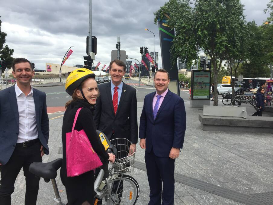 Changes for Brisbane Metro are unveiled by MP Trevor Evans, cycling advocate Anne Savage, lord mayor Graham Quirk and deputy mayor Adrian Schrinner. Photo: Tony Moore