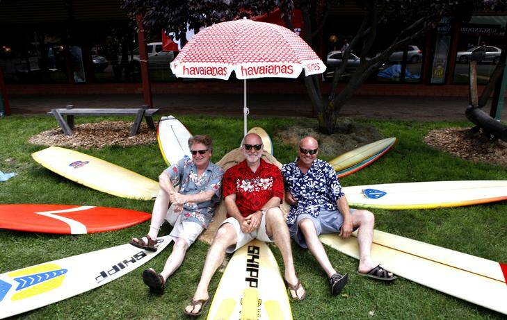 Bungendore Gallery was converted into a beach for a day. From left: David MacLaren (Gallery Owner), Stan d'Argeavel and Andrew Oliver. Photo: Katherine Griffiths
