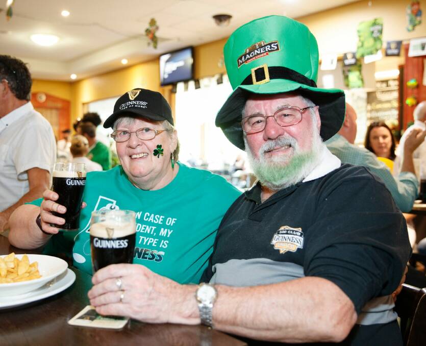 Lori and Alf Charlton enjoying a pint of Guinness. Photo: Sitthixay Ditthavong