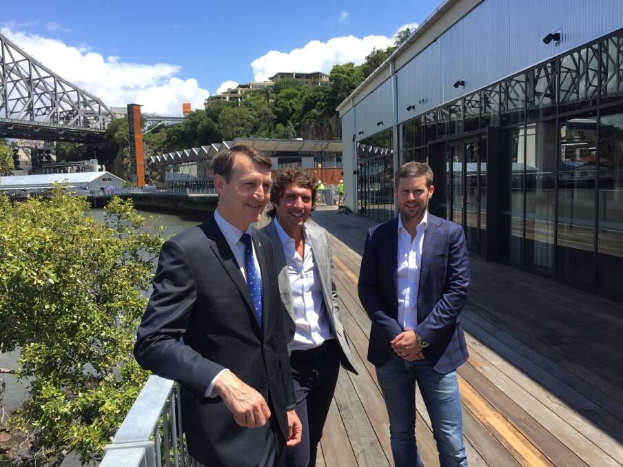 Lord Mayor Graham Quirk talks with Howard Smith Wharves chief executive Luke Fraser (right) and director Adam Flaskas( centre). Photo: Tony Moore
