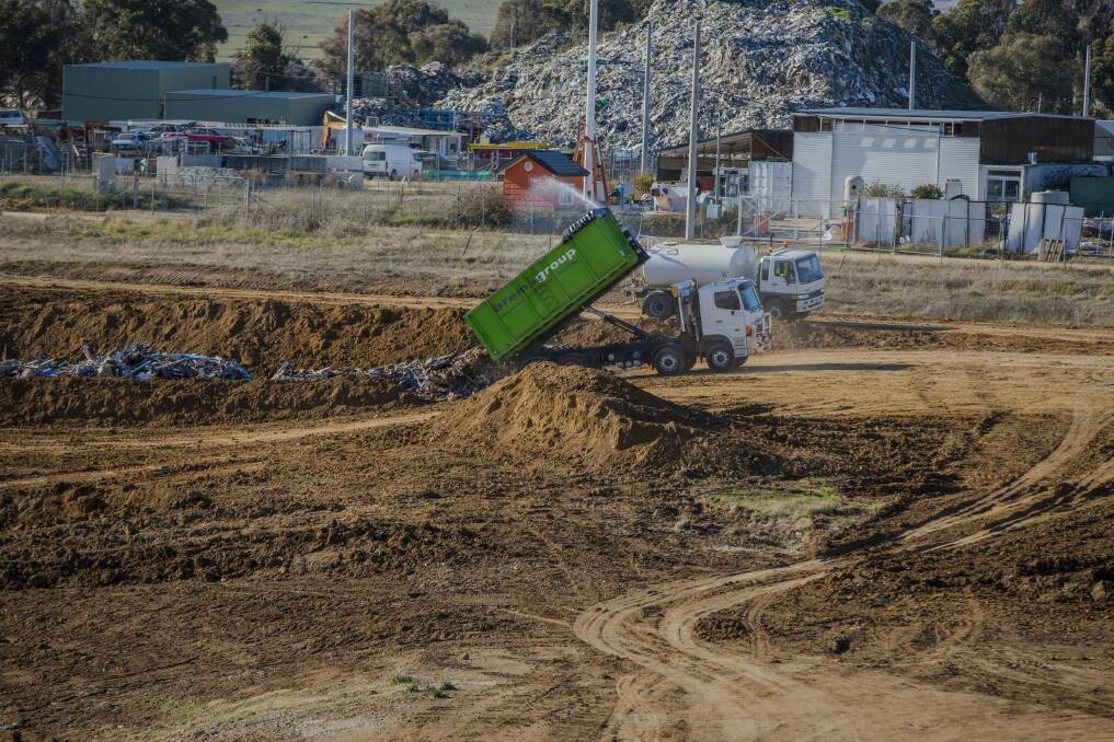 The West Belconnen Fluffy dumping site receives an average 38 truck and skip loads of demolition material a day.  Photo: Jamila Toderas