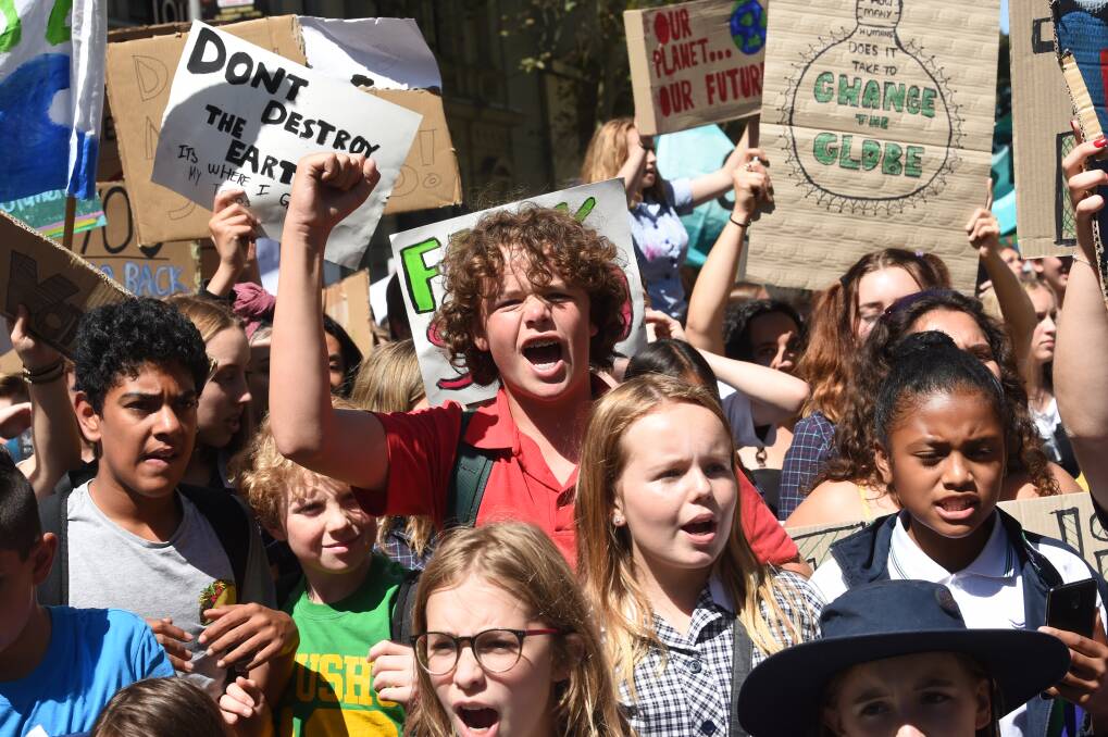 Students from across Victoria raised their voices to protest political inaction on climate change. Photo: Justin McManus