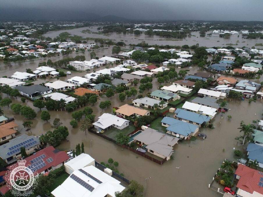 An aerial view of the flooding in the Townsville suburb of Oonoonba on Monday morning. Photo: QFES