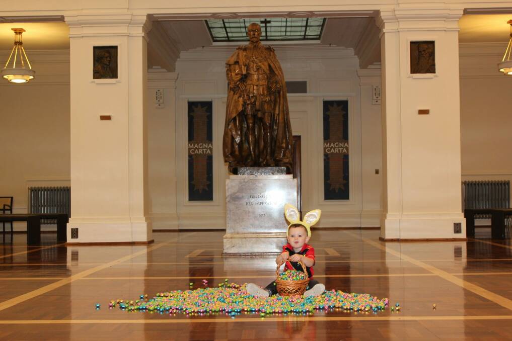 Christian Taylor, from Jerrabomberra, with some of the eggs for the Easter egg hunt at Old Parliament House. Photo: Museum of Australian Democracy