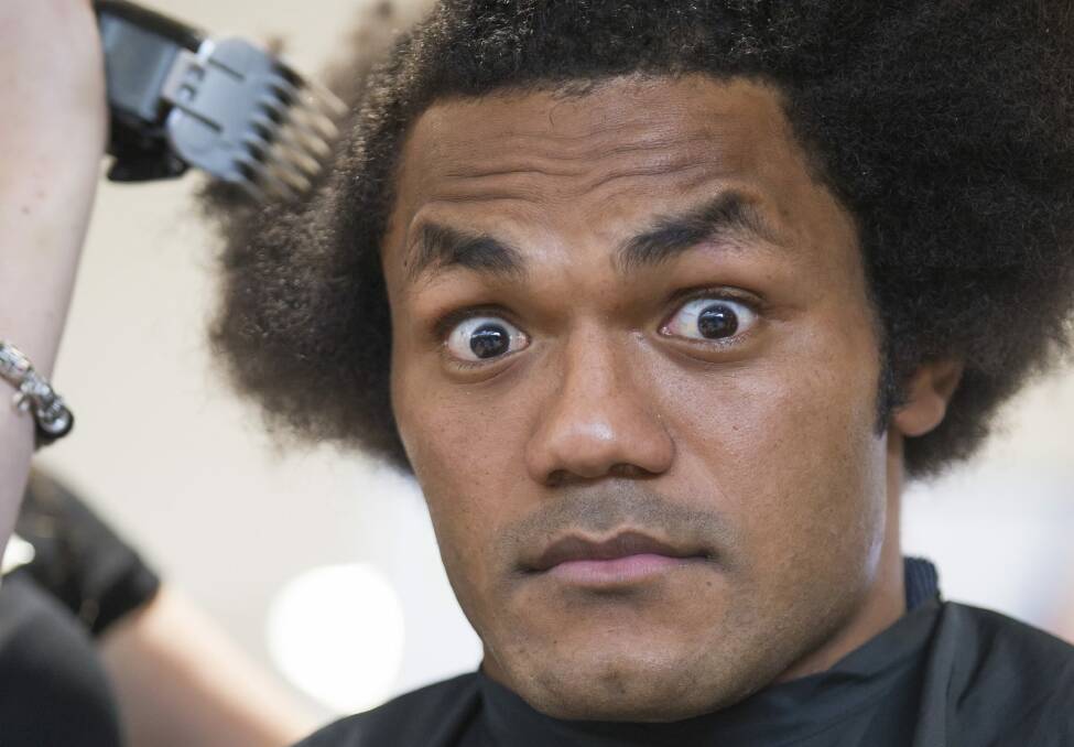 The kindest cut: Henry Speight loses the 'fro to raise money for cancer sufferers. Photo: Mark Bedford