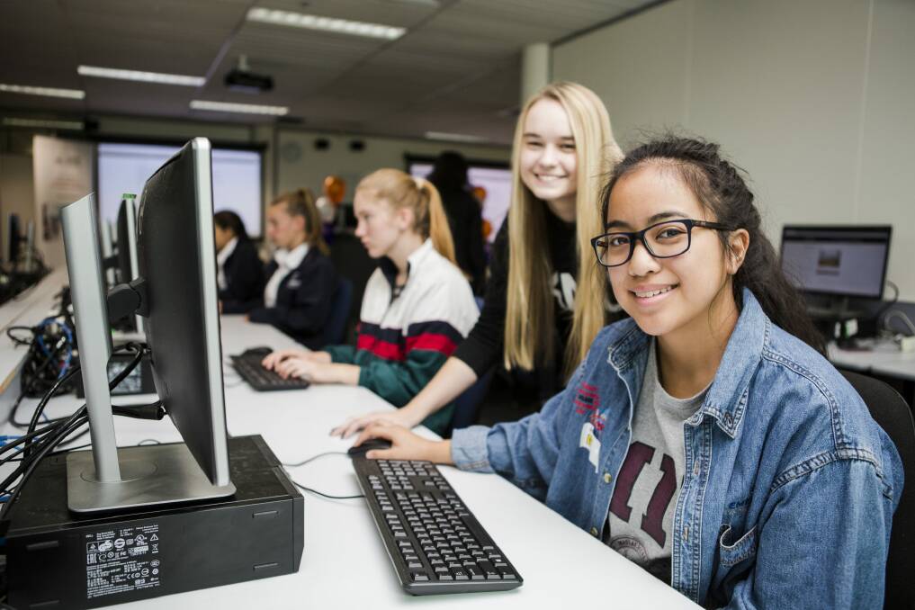 St Clare's College year 12 student Mia Bueno, 17, and first-year software engineering student Paige Brown, 19.
 Photo: Jamila Toderas