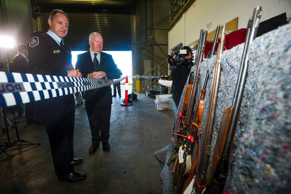ACT Policing deputy chief police officer Mark Walters and Minister for Police Mick Gentleman at the National Firearms Amnesty announcement. Photo: Dion Georgopoulos