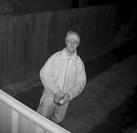 The man captured on film in a Higgins backyard. 
