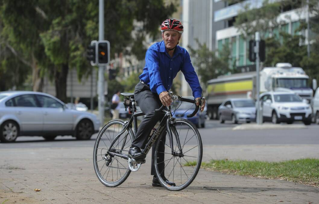 Pedal Power's John Armstrong at the corner of Northbourne Avenue and Barry Drive, part of the worst accident zone for cyclists in Canberra. Photo: Graham Tidy
