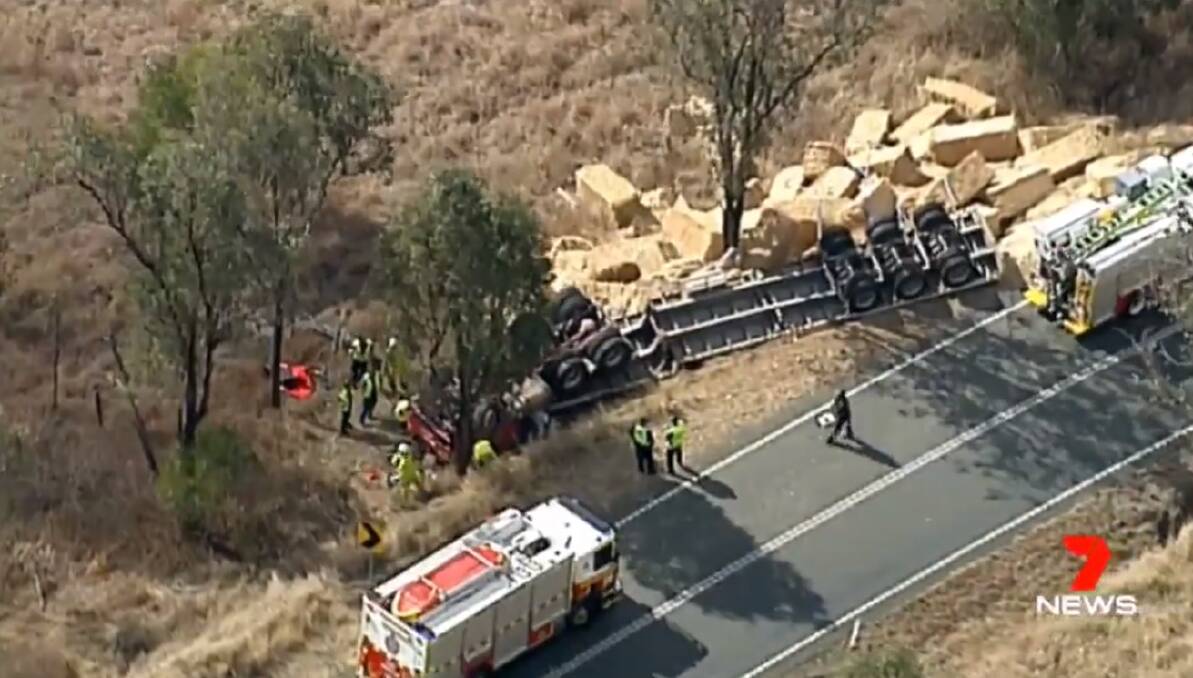 The prime mover was carrying hay when it rolled. Photo: 7 News Queensland/Twitter