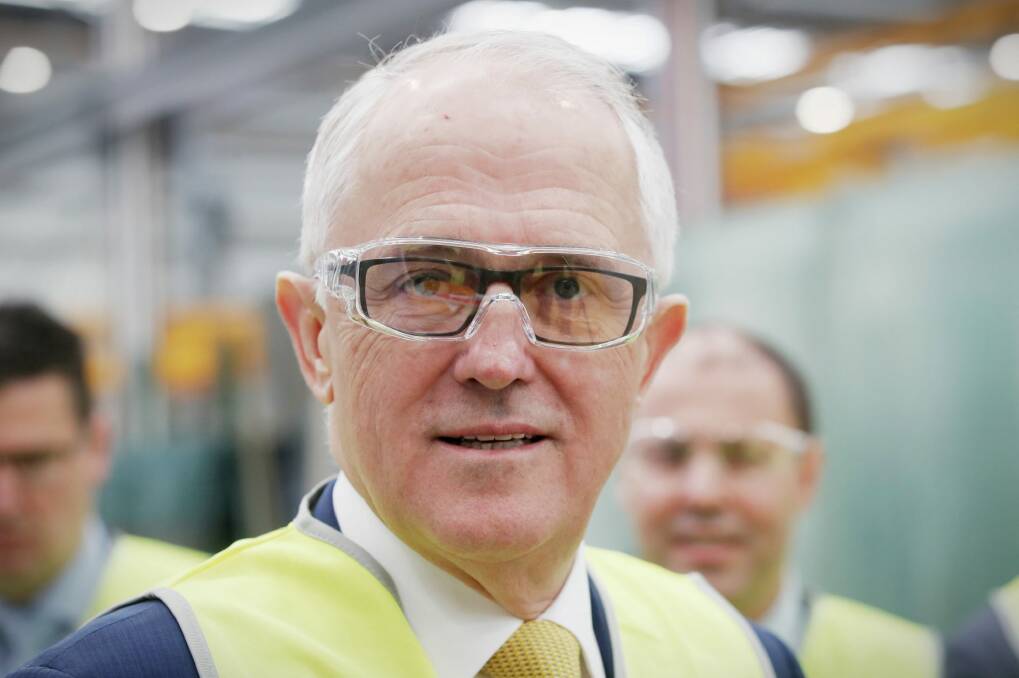 Prime Minister Malcolm Turnbull faced a barrage of questions about the NBN on a visit to the CSR Viridian glass facility in Canberra on Monday Photo: Andrew Meares