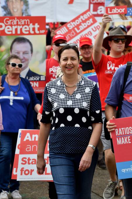 Premier Annastacia Palaszczuk announced a parliamentary inquiry into wage theft during a Labour Day march on Monday. Photo: Darren England/AAP