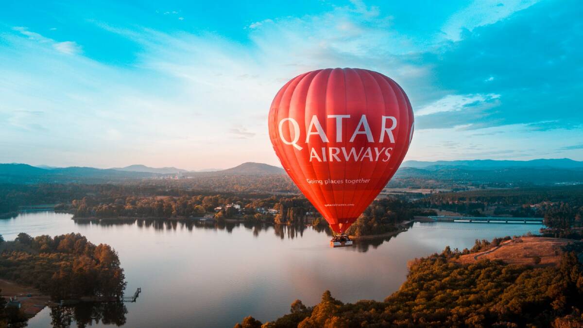 The Qatar Airways balloon, flown by Balloon Aloft Canberra, flies over Canberra. Photo: Ken Butti