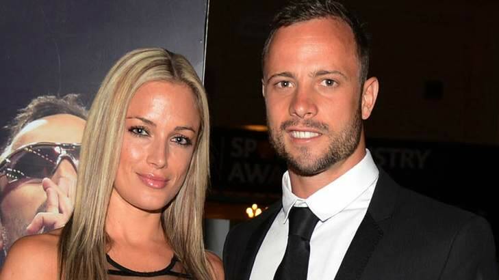 Oscar Pistorius (R) and his girlfriend Reeva Steenkamp pose for a picture in Johannesburg, February 7. Photo: Reuters/Thembani Makhubele
