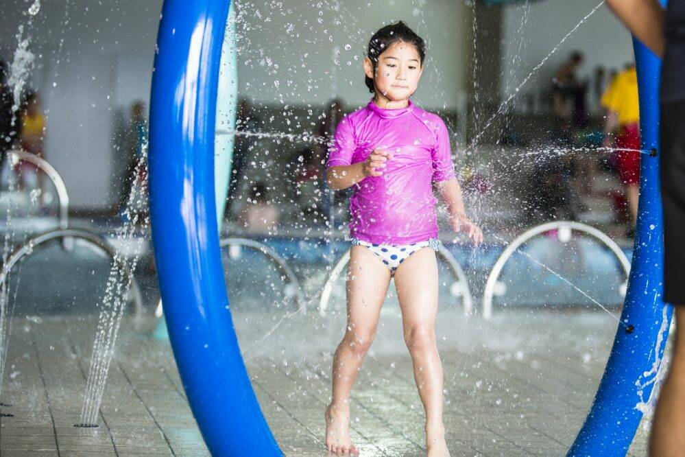 Genevieve Wells, 6, enjoys the water, at the newly-opened Gungahlin Leisure Centre. Photo: Jamila Toderas