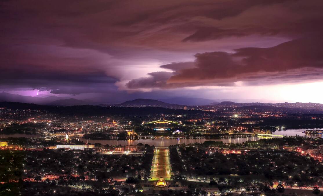 Canberra's 'Lib Lab Land' would film at night atop Mount Ainslie with the lights of the federal capital twinkling below. Photo: Franklin Wang