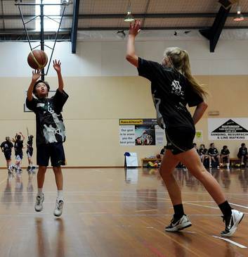 Anson Thai puts up a shot during the 2 on 2 at Southern Cross Stadium yesterday.. Photo: Colleen Petch
