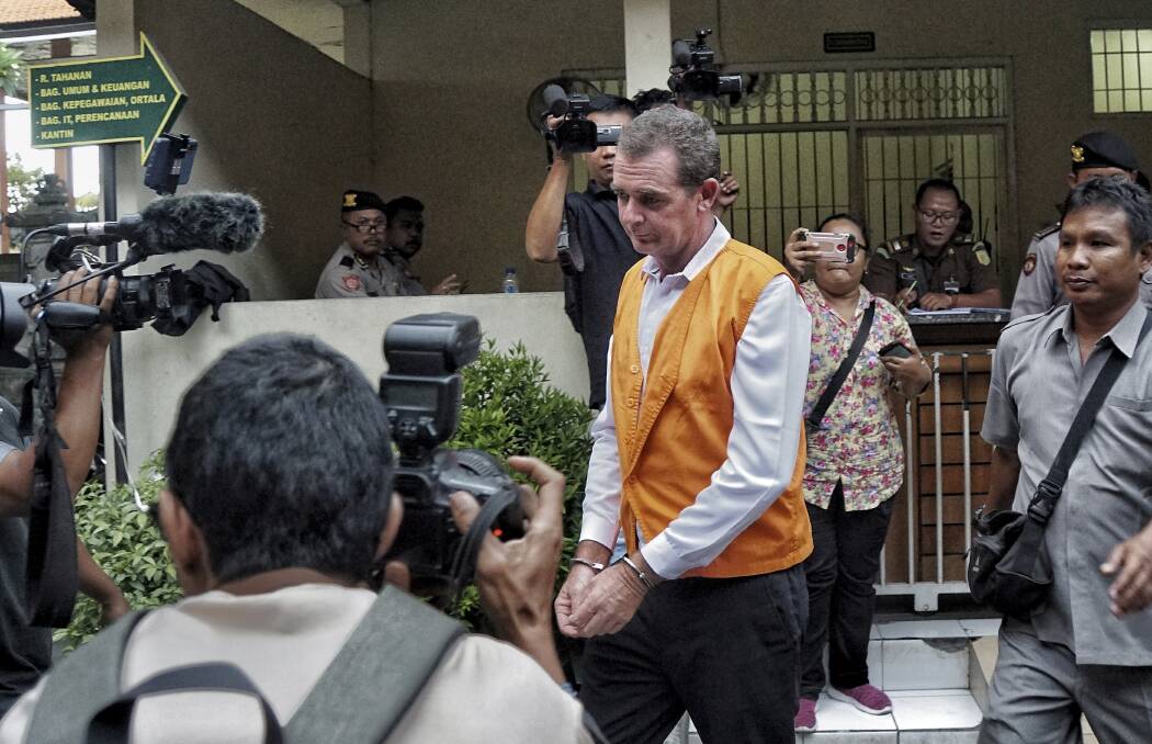 Johnsson taken to court room for his first trial at Denpasar district court. Photo: Amilia Rosa