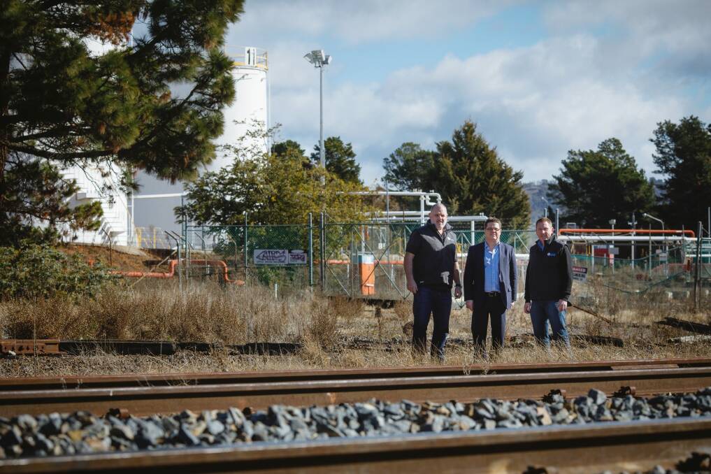 Project manager Ewen McKenzie, Dean Ward from ActewAGL, and Capital Recycling Solutions director Adam Perry at the Fyshwick site marked for development as a waste recycling facility. Photo: Sitthixay Ditthavong
