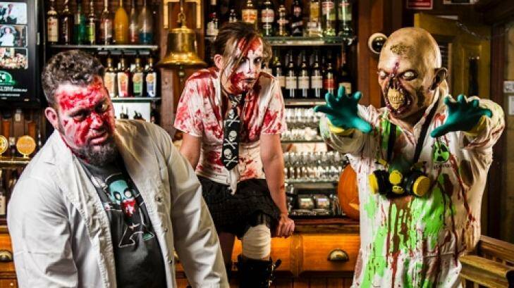 Plastered: Did Zombies Colin O'Mullane, left,  Victoria Ashman and Neil Stork-Brett get into the rotgut in King O'Malley's before the 2013 zombie walk? Photo: Rohan Thomson