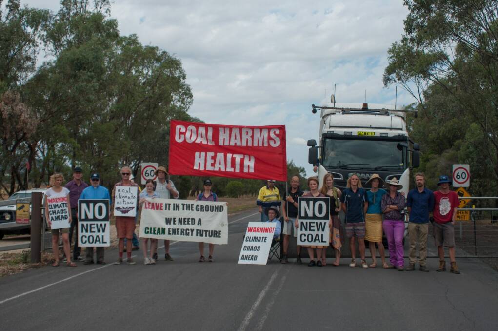 United stand: Protesters at the Gunnedah coal-processing plant on Wednesday. Photo: Courtesy of Jeff Tan