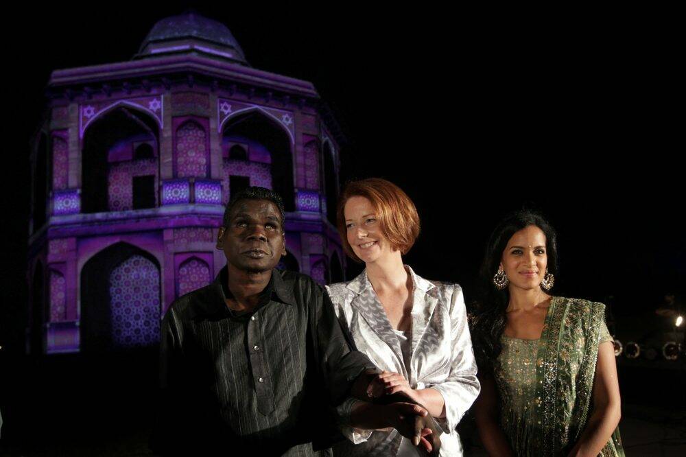 Prime Minister Julia Gillard meets with musicians Gurrumul Yunupingu (left) and Anoushka Shankar (right) who performed at the opening of Oz Fest at Purana Qila, in India on Tuesday 16 October 2012.
