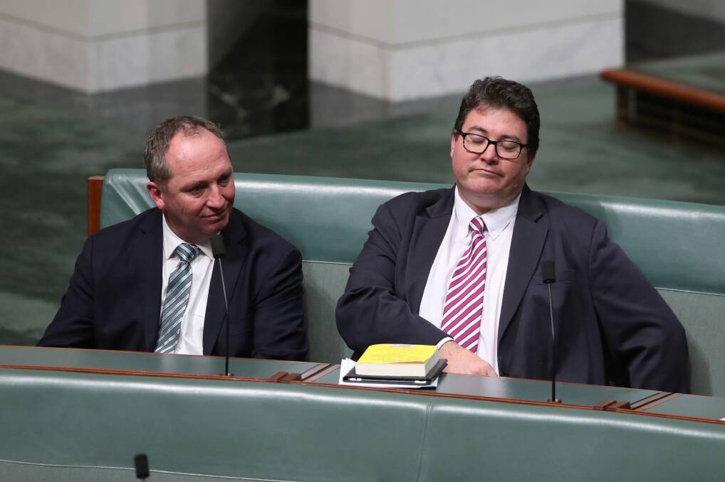 Deputy Prime Minister Barnaby Joyce and George Christensen during the second reading of the Banking and Financial Services Commission of Inquiry Bill. Photo: Andrew Meares