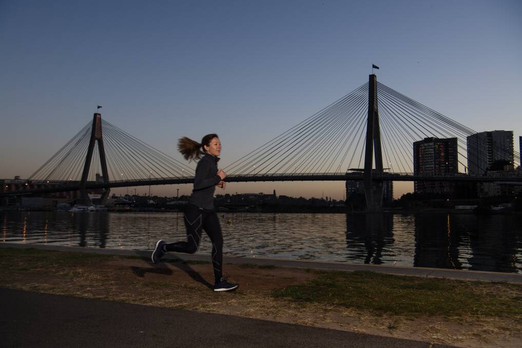 Jacqui Allen says the best part of her inner city running route is the views of the Sydney Harbour Bridge and the Anzac Bridge. Photo: Louise Kennerley