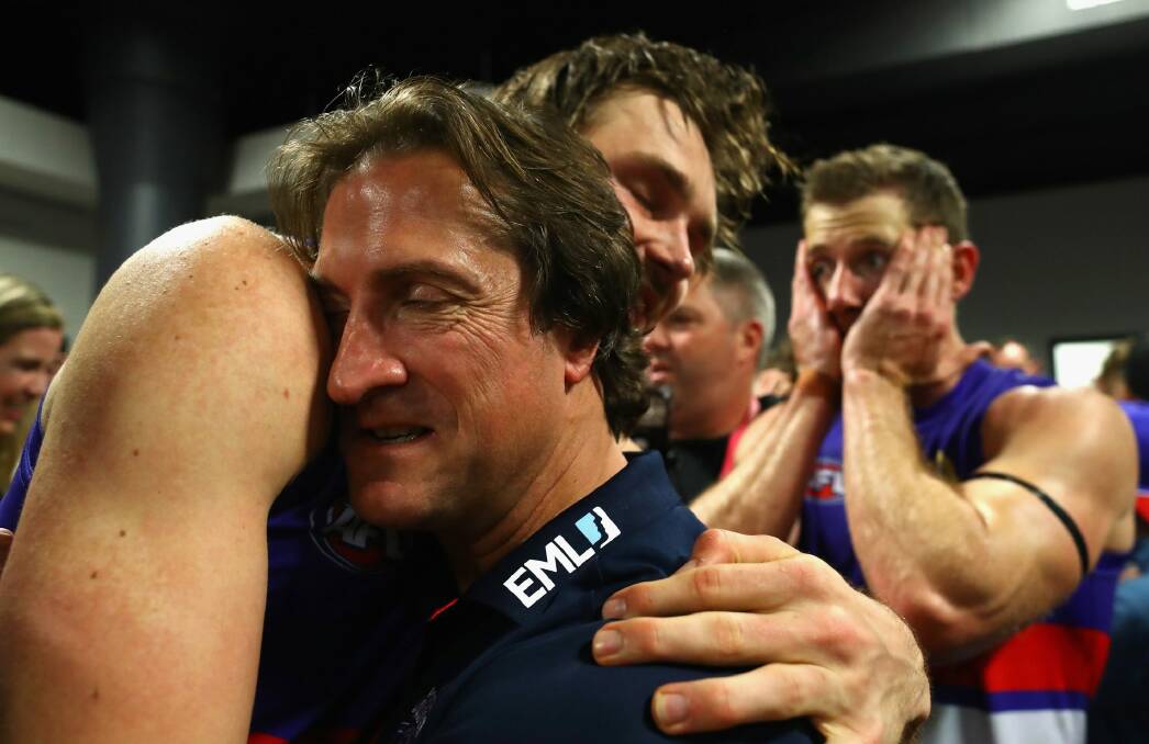 Western Bulldogs coach Luke Beveridge celebrates with his players. Photo: Getty Images