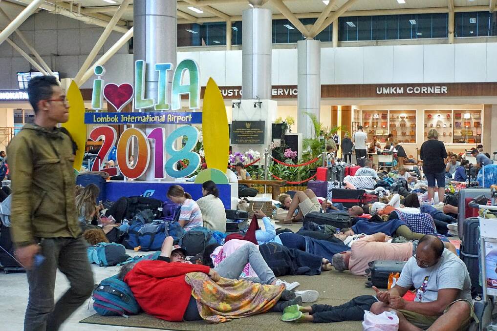 Hundreds of tourists slept at Lombok Airport waiting for the first chance to leave. Photo: Amilia Rosa