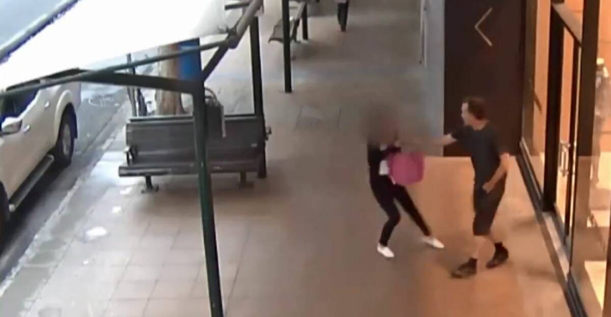 Handbag thief approaches woman in Brisbane's CBD in November. Police are looking for the man. Photo: Queensland Police Service