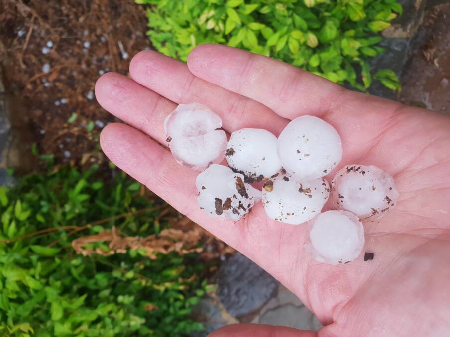 Hailstones in Duffy after a thunderstorm in Canberra. Photo: James McIntosh