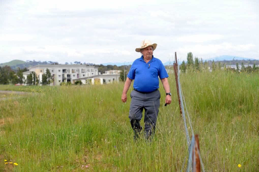 Brian Rhynehart at the site of the new suburb of Lawson in Belconnen in 2010. Photo: Richard Briggs