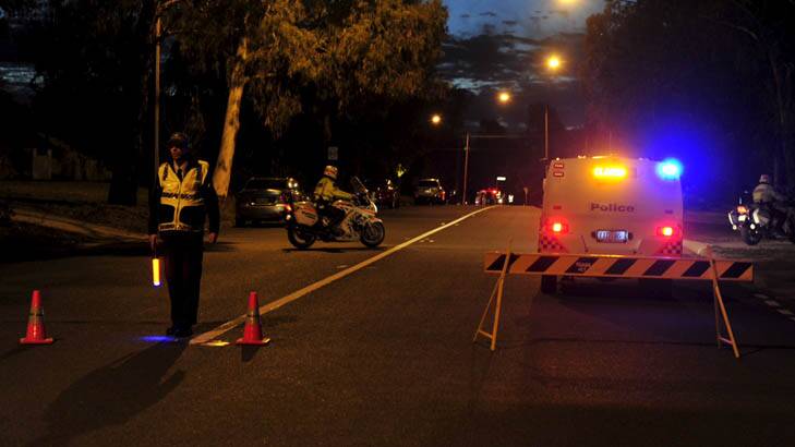 Police on the scene of a fatal pedestrian incident in Mawson. Photo: Jay Cronan