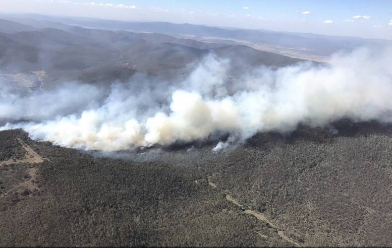 A prescribed burn in Namadgi National Park jumped containment lines on Sunday as Canberra sweltered in temperatures that topped 31 degrees Celsius. Photo: Supplied