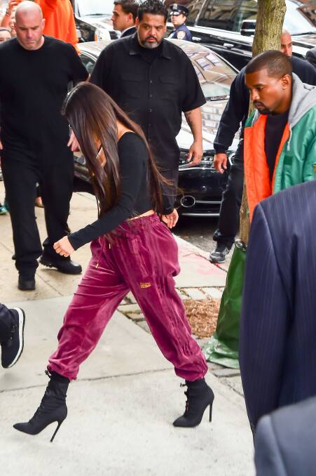 Kim Kardashian and Kanye West arrive at their Manhattan apartment after Kim arrived home from Paris. Photo: Getty Images