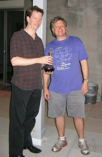 Sean Carroll, Brian Schmidt  and a bottle of port. Photo: Supplied
