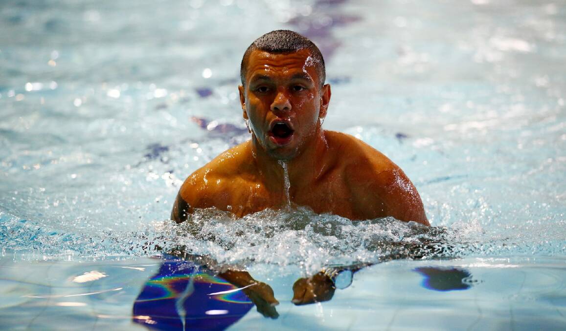 Pool of life: Kurtley Beale swims during an Australia team recovery session in London. Photo: Getty Images
