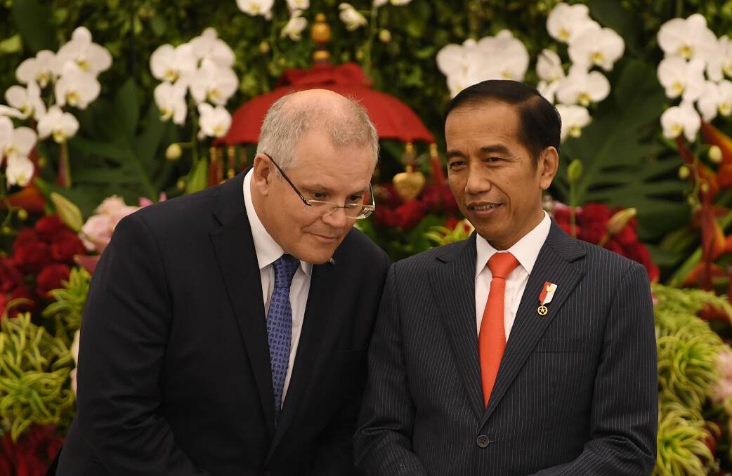 Australian Prime Minister Scott Morrison and Indonesian President Joko Widodo at their deal signing ceremony on Friday. Photo: AAP
