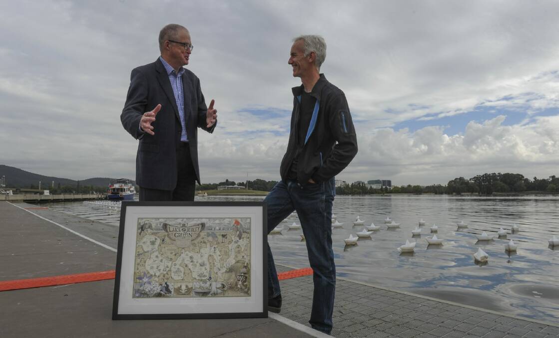 Gang Gang. The Canberra Times cartoonist, David Pope, right, today presented a copy of his Lake Burley Griffin artwork to National Capital Authority CEO, Malcolm Snow, on the shores of the lake. March 3rd. 2015 The Canberra Times photograph by Graham Tidy. Photo: Graham Tidy