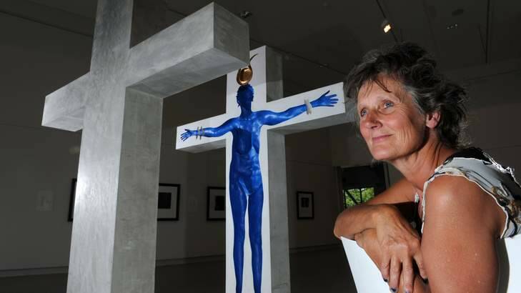 Sculptor Victoria Royds with her two-tonne work <i> Blue Isis </i> which is part of a three-way exhibition <i> Nearly Birds</i>. Photo: Graham Tidy