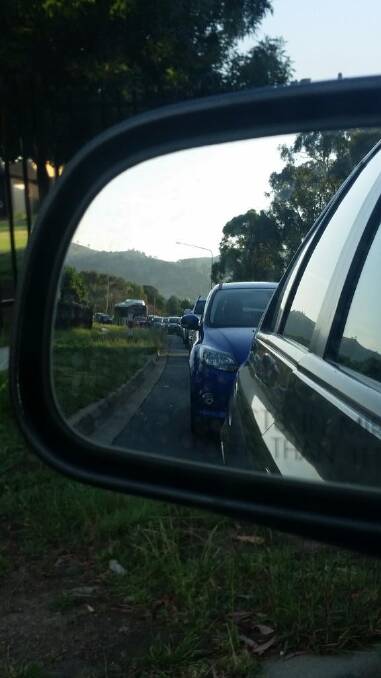 The line of traffic snakes off into the distance in Tuggeranong. Photo: Laura Marsh