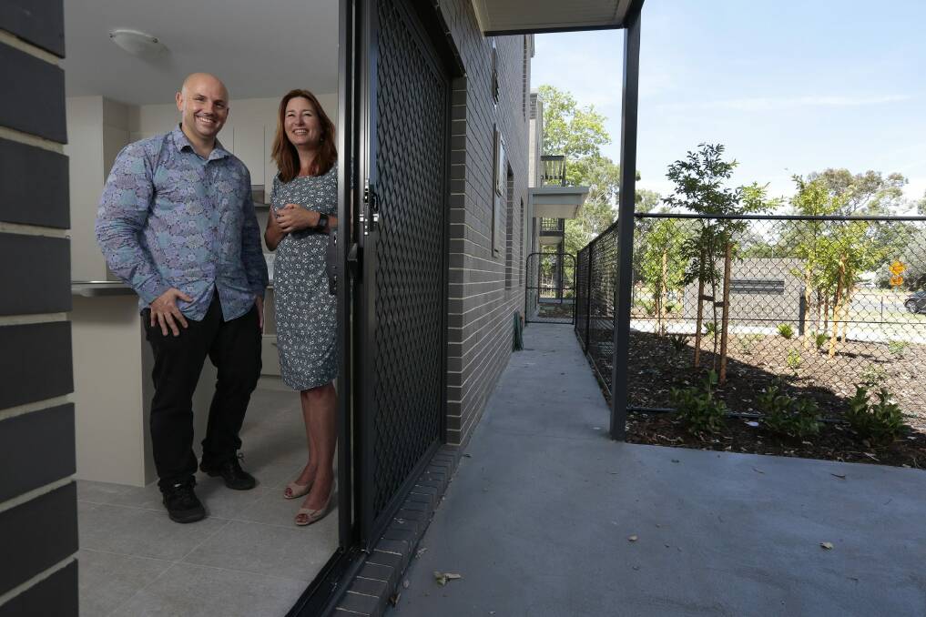 Head of Housing and Community Services David Matthews with Housing Minister Yvette Berry in one of eight new public housing units in O'Connor in December. Photo: Jeffrey Chan