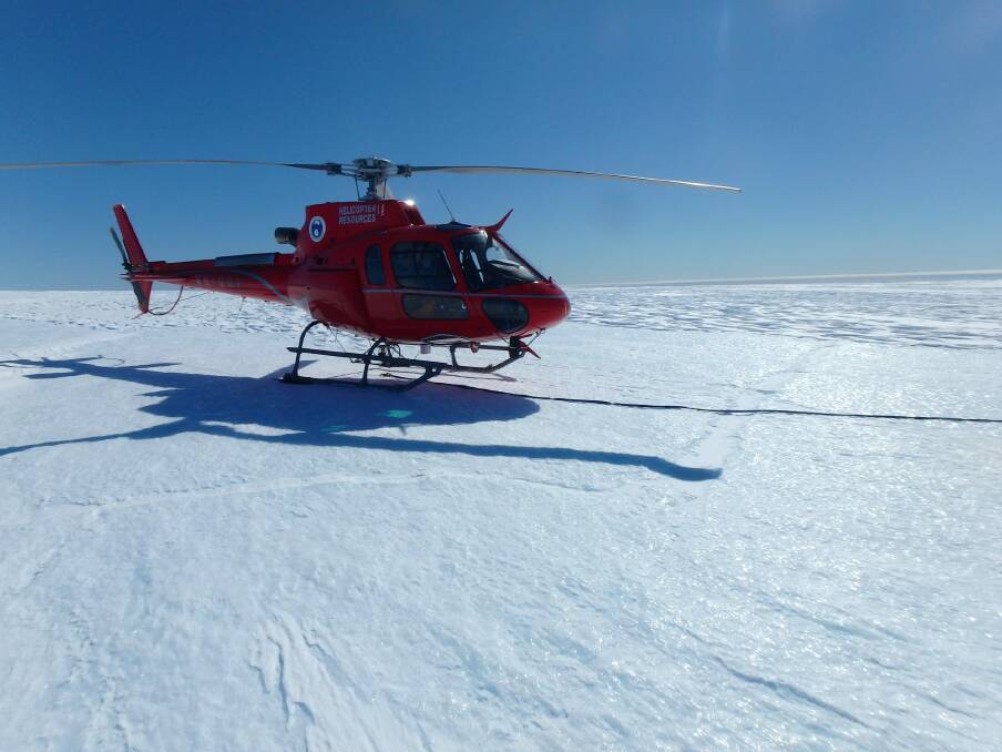 In this photograph of the fuel cache site on December 8, 2015, a glaciologist at the inquest identified a right-angled crevasse in front of the helicopter. Photo: Supplied