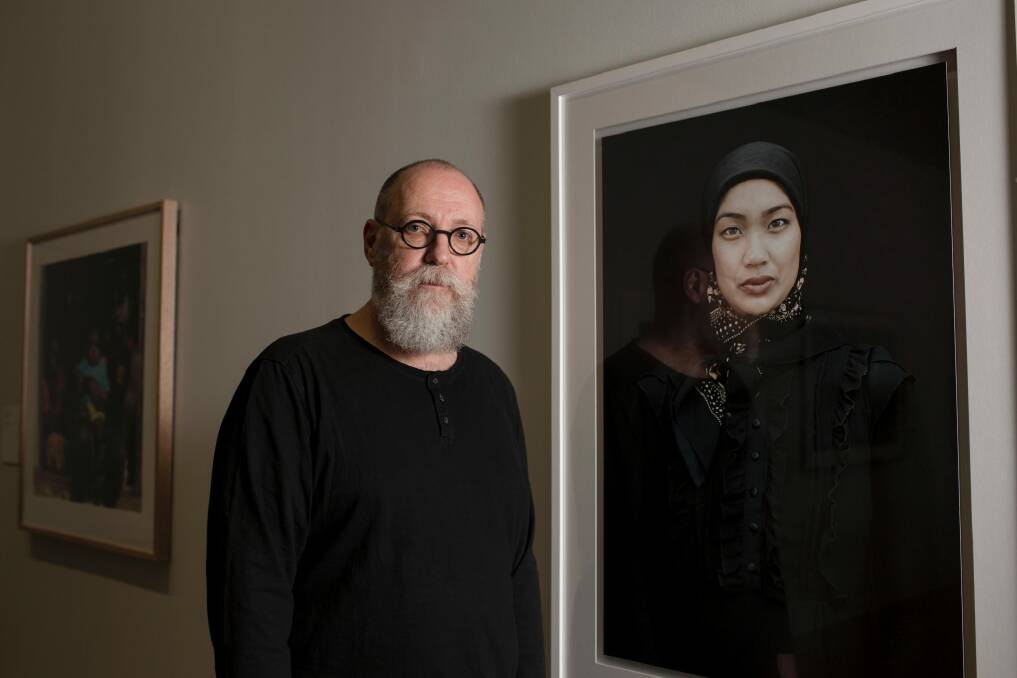 Photographer Brett Canet-Gibson with his highly commended photograph, Mastura. Photo: Jamila Toderas
