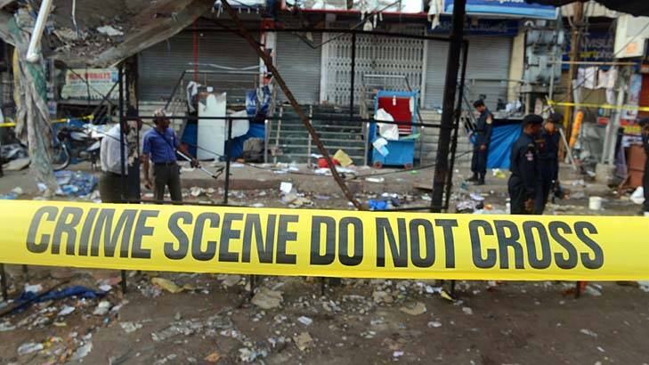 Indian police search for clues at one of the blast sites  in Hyderabad. The police have admitted that they knew Hyderabad was a potential target. Photo: AFP